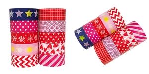 Detailed view of ten colorful washi tape rolls with stars and geometric patterns