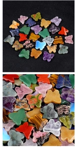 Macro shot of assorted carved natural crystal and agate stones in butterfly shapes