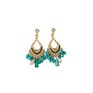Bohemian gold-tone teardrop tassel earrings with green and white beads on white background