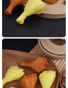 Macro detail of realistic PVC chicken drumstick model with skin texture and key ring