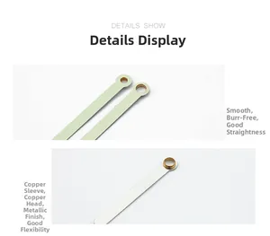 Detailed close-up of smooth watch clock hands with precise copper bushings and metal finish