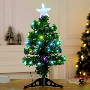 Lush green fiber optic Christmas tree with glowing star topper and black base stand