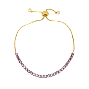 Elegant gold adjustable bracelet with sparkling round purple zircons on white background