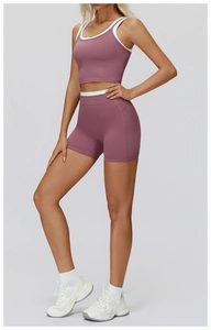 Detail view of high-waisted fitness shorts with contrast trim and ribbed elastic fabric