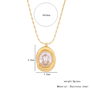 Detailed view of golden stainless steel necklace with dimensions and oval crystal pendant