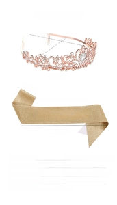 Detail view of the rose gold rhinestone crown and gold HOT MAMA party sash dimensions