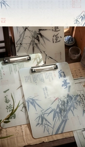 Detail of acrylic clipboard featuring traditional Chinese ink bamboo and calligraphy art