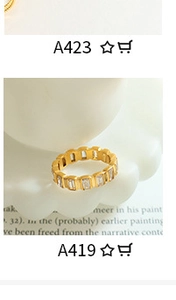 Macro shot of gold baguette eternity ring on white display tray for jewelry detail