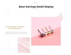 Detail view of minimalist ball stud earrings in black, silver, gold, and rose gold finish