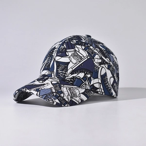 Detail of baseball cap featuring blue and white athletic sneaker sketch graffiti print