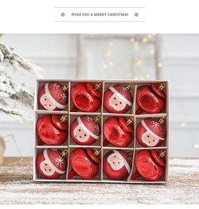 Detail of 12pcs red and white Christmas balls in gift box with Santa Claus patterns