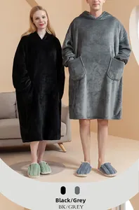 Detail of plush flannel wearable blanket with large hood and deep storage pockets