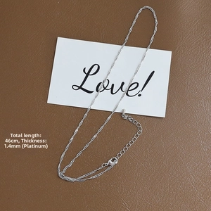 Detail of 46cm silver-plated water wave chain with lobster clasp and adjustable tail