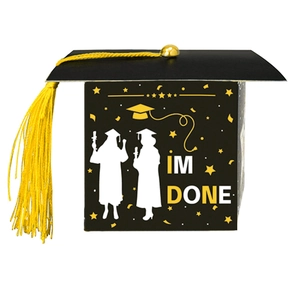 Close-up of black graduation cap gift box with 'IM DONE' text and yellow tassel detail