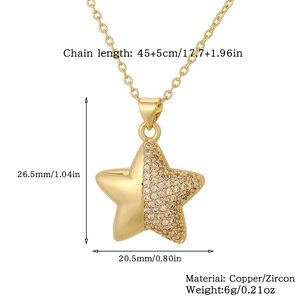 Detail view of gold star necklace pendant with zircon showing exact chain dimensions