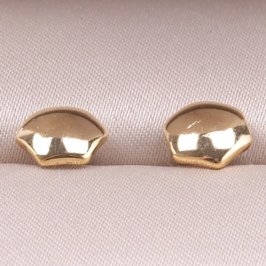 Close-up of golden 304 stainless steel star stud earrings with a polished mirror finish