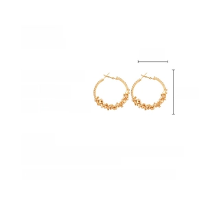 Detail showing gold hoop earrings with rhinestones including size and weight specs