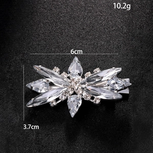 Elegant silver rhinestone hair clip with sparkling crystal flower design, 6cm x 3.7cm size