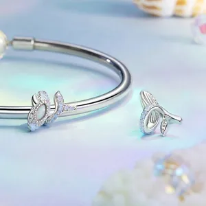 S925 sterling silver whale tail bracelet featuring iridescent opal stone charm