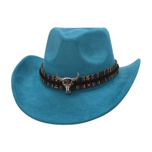 Detail of blue suede cowboy hat featuring a tribal band and silver bull skull charm
