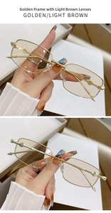 Detail view of golden square metal frames with light brown gradient lenses and deco temples