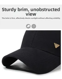 Close-up of durable ripstop fabric and triangle metal logo on black baseball cap