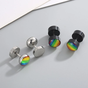Detail of barbell stud earrings in silver and black with colorful rainbow stripe patterns