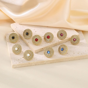 Vintage sunburst titanium steel stud earrings with colorful crystals and pavé diamonds
