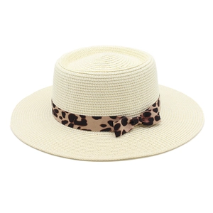 Detailed view of cream straw boater hat featuring a stylish leopard print ribbon and bow