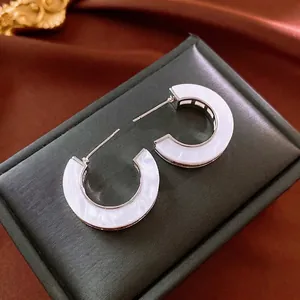 Silver-plated C-shaped hoop earrings with white mother-of-pearl inlay for women