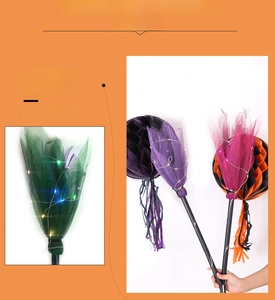 Detail of LED light-up mesh on colorful Halloween witch brooms for party decor