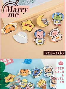 Detail of acrylic astronaut animal badges featuring cute frogs, rabbits and pigs