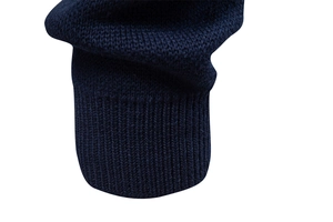 Detailed macro view of dark blue ribbed knitted cuff on a men's zip-up cardigan jacket
