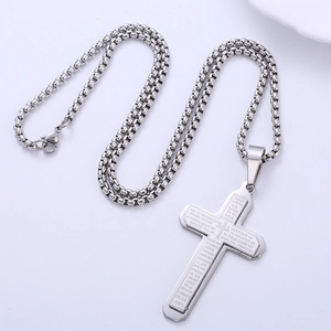 Polished silver stainless steel cross necklace with engraved Spanish Lord's Prayer text