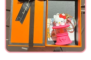Hello Kitty night light keychain in orange gift box with love you forever ribbon