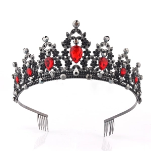 Detail of Gothic black alloy tiara featuring red teardrop crystals and side hair combs