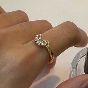 18k gold plated stainless steel open moon ring with blue and white zircon on hand