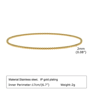 Detail showing 2mm gold beaded stainless steel bracelet with 17cm inner circumference