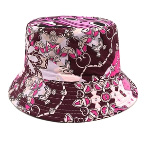 Close-up of geometric pattern stitching on colorful reversible canvas bucket hat