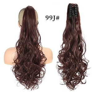 Macro detail of deep wine red 99J wavy claw clip ponytail extension on a white background