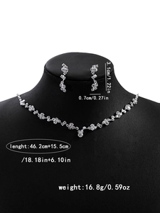 Detail view of silver bridal jewelry set with dimensions and weight measurements