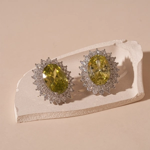 Vintage oval yellow zircon earrings with silver needle in a minimalist French luxury style