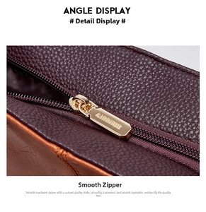 Premium leather shoulder bag detail showing durable golden metal zipper and texture.