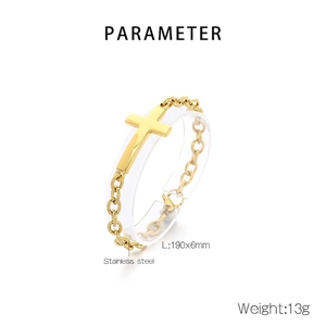 Macro detail of golden stainless steel cross bracelet with 190x6mm size specification