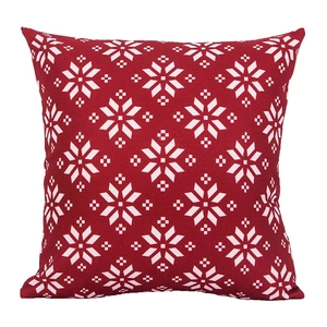 Red Christmas pillow cover featuring white snowflake patterns for holiday sofa decor