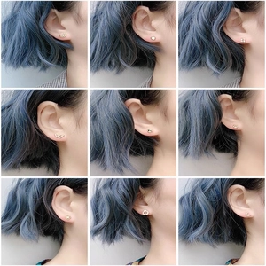 Detail shots of minimalist gold and silver stud earrings in various geometric shapes