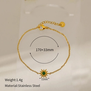 Detail of gold stainless steel bracelet with green stone sun pendant and dimensions