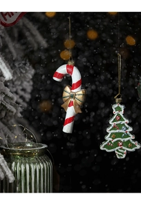 Christmas tree hanging ornaments with candy cane, golden bow, and bokeh lighting