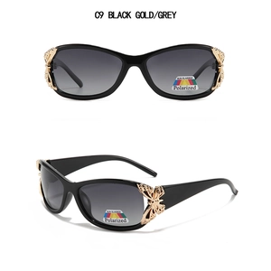 Detailed view of Y2K polarized butterfly sunglasses with black gold frame and grey lenses