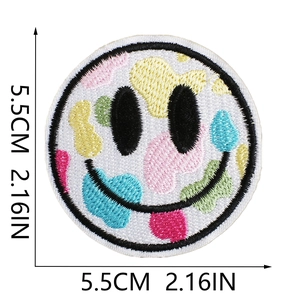 Detailed view of 5.5cm round colorful smiley face embroidery patch with size measurements